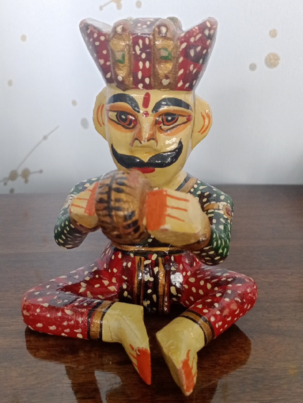 Hand-Painted Red and Green Folk Art Seated Musician Figurine